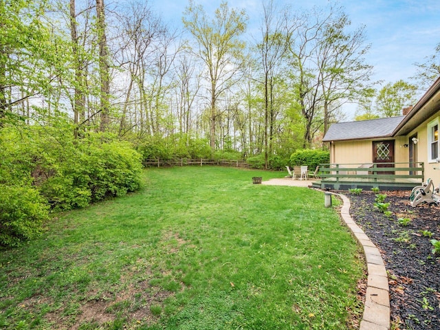 view of yard with a patio and fence