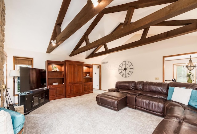 living room featuring light colored carpet, beam ceiling, high vaulted ceiling, a chandelier, and visible vents