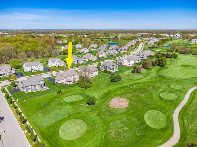 aerial view featuring a residential view and view of golf course