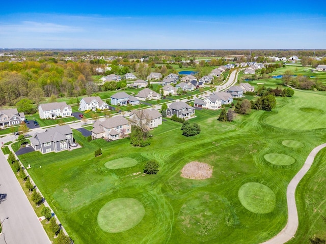 bird's eye view featuring view of golf course and a residential view
