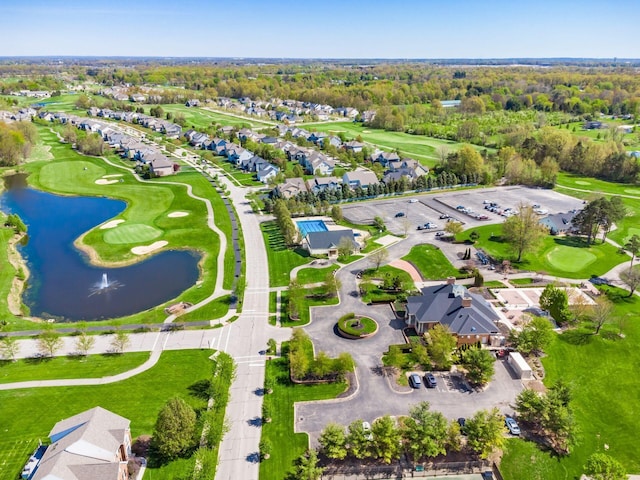 bird's eye view with a residential view, a water view, and golf course view