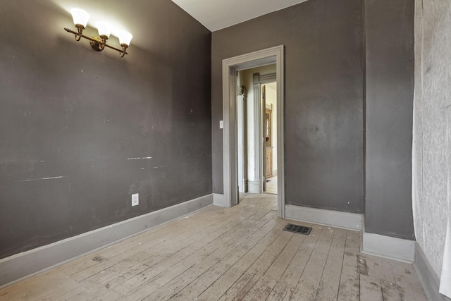 423 Hudson Ave, Newark, OH 43055 - spare room with visible vents, hardwood / wood-style floors, and baseboards