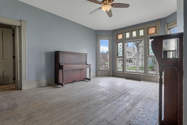 423 Hudson Ave, Newark, OH 43055 - interior space featuring baseboards, ceiling fan, and wood-type flooring