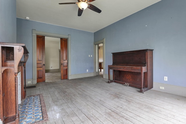 423 Hudson Ave, Newark, OH 43055 - living area with a ceiling fan, baseboards, and wood-type flooring