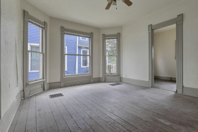 423 Hudson Ave, Newark, OH 43055 - empty room with visible vents, ceiling fan, and hardwood / wood-style floors