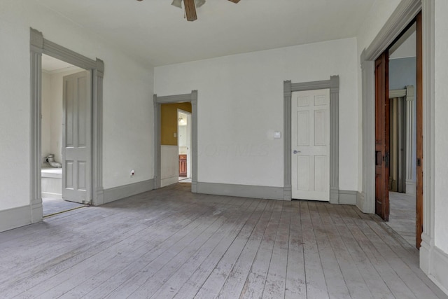 423 Hudson Ave, Newark, OH 43055 - unfurnished room featuring ceiling fan, baseboards, and light wood-type flooring