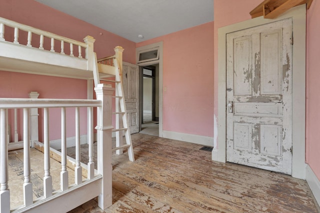 423 Hudson Ave, Newark, OH 43055 - unfurnished bedroom with baseboards and wood finished floors