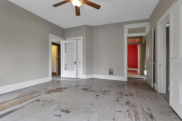 423 Hudson Ave, Newark, OH 43055 - empty room featuring baseboards, hardwood / wood-style floors, ceiling fan, and visible vents