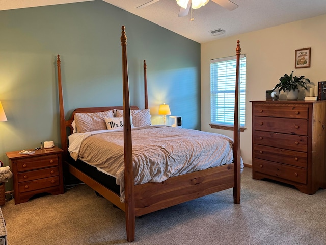 bedroom with carpet floors, ceiling fan, and visible vents