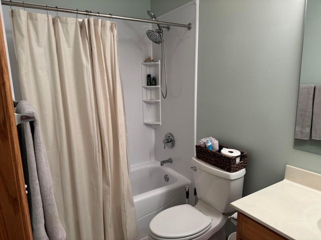 bathroom featuring vanity, toilet, and shower / tub combo