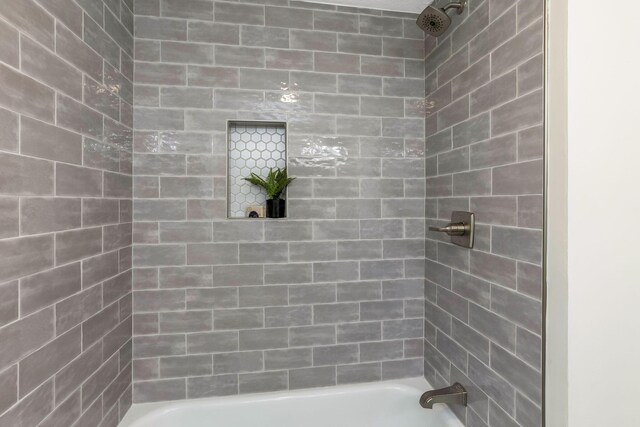 full bathroom with bathing tub / shower combination