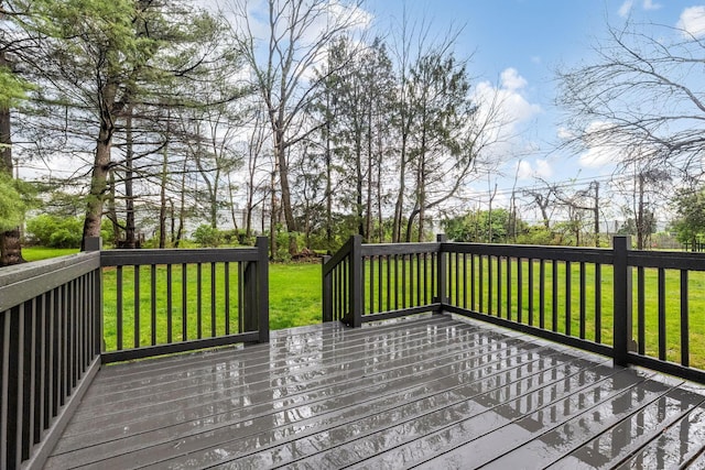 wooden deck with a yard