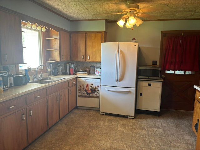 5398 Marietta Rd SE, New Lexington, OH 43764 - kitchen featuring stainless steel microwave, freestanding refrigerator, ceiling fan, a sink, and dishwashing machine