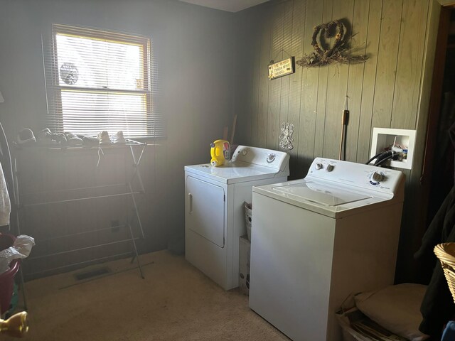5398 Marietta Rd SE, New Lexington, OH 43764 - laundry room featuring laundry area, wood walls, light colored carpet, and washer and clothes dryer