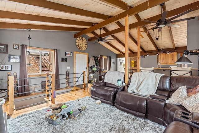 living room featuring vaulted ceiling with beams, ceiling fan, wood ceiling, and hardwood / wood-style floors