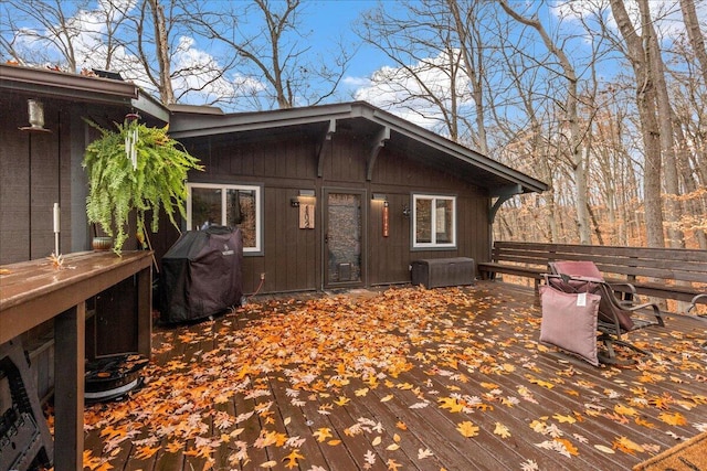 deck featuring a grill