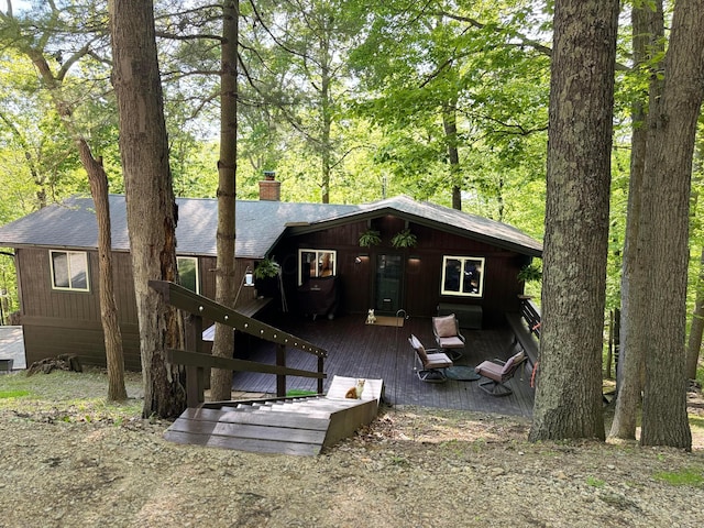 102 Mohawk Ln, Sugar Grove, OH 43155 - back of property with a chimney, a shingled roof, and a wooden deck