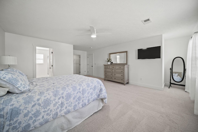 bedroom with carpet flooring, a ceiling fan, baseboards, and visible vents