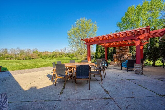 view of patio / terrace featuring a pergola, outdoor dining area, and an outdoor stone fireplace