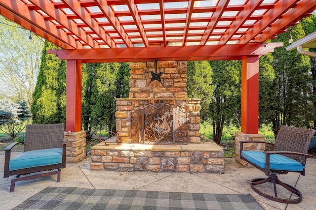 view of patio with an outdoor stone fireplace