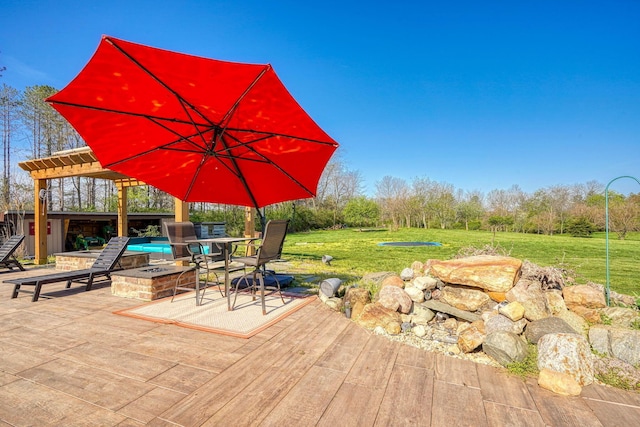 view of patio / terrace featuring an outdoor fire pit