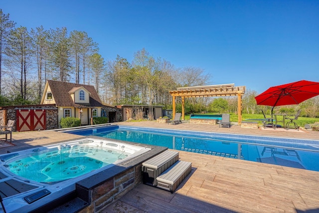 outdoor pool featuring an outbuilding, an in ground hot tub, a storage structure, and a pergola