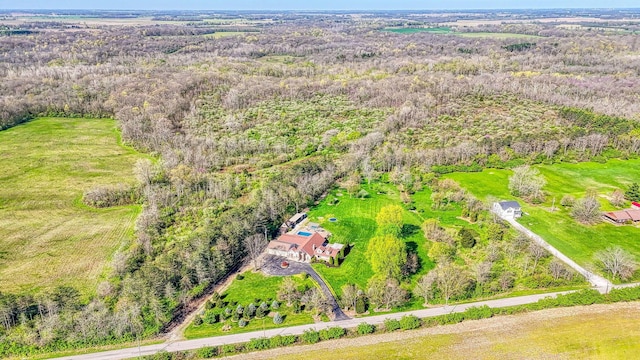 aerial view with a wooded view