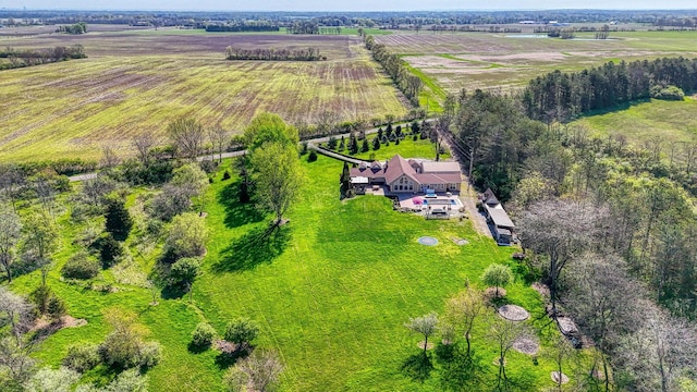 birds eye view of property featuring a rural view