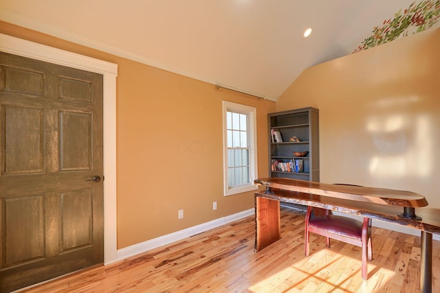 office space featuring light wood-type flooring, recessed lighting, baseboards, and lofted ceiling