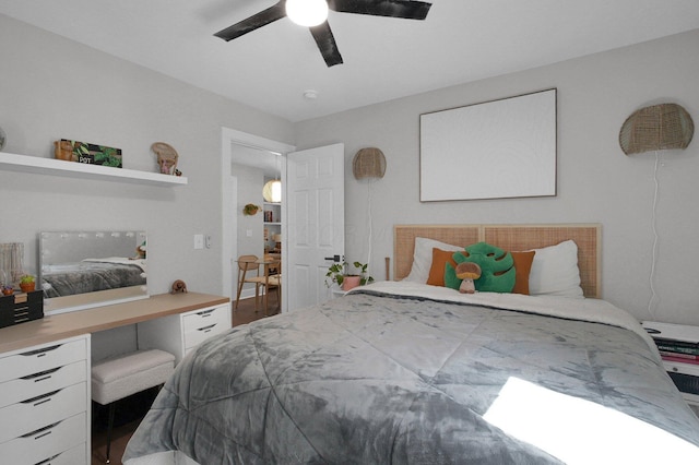 bedroom with ceiling fan and wood finished floors