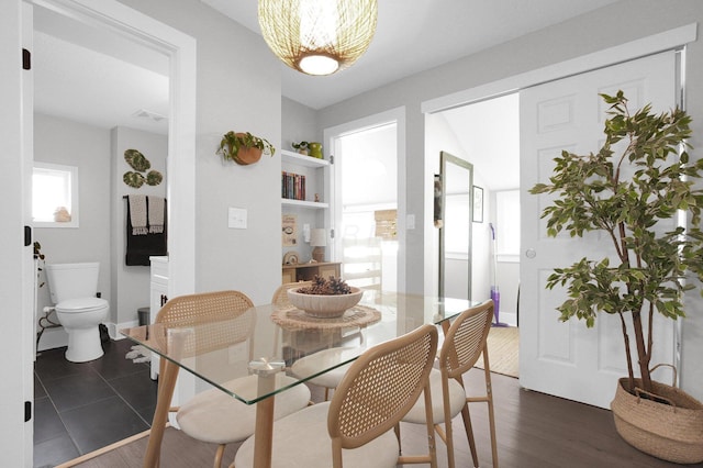 dining area featuring visible vents