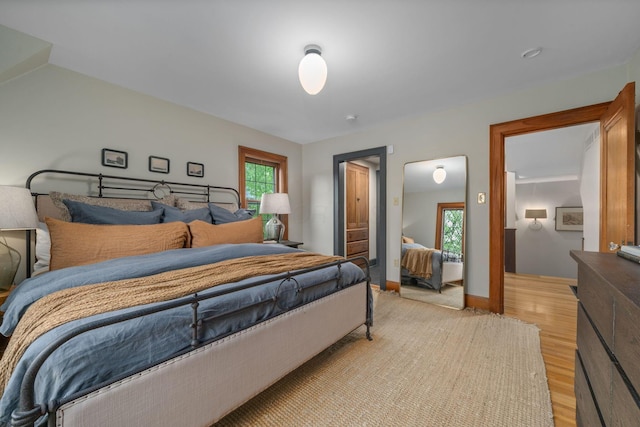 152 S Stanwood Rd, Columbus, OH 43209 - bedroom featuring light wood finished floors and multiple windows