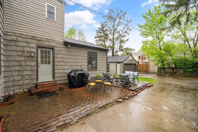 152 S Stanwood Rd, Columbus, OH 43209 - view of patio with entry steps, fence, an outbuilding, and area for grilling