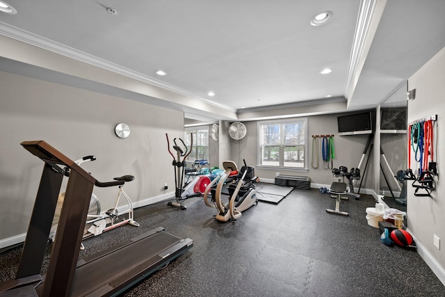 exercise room featuring recessed lighting, ornamental molding, and baseboards