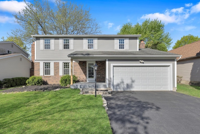 7847 Maplecreek Ct, Powell, OH 43065 - view of front facade with brick siding, a garage, aphalt driveway, a front yard, and a chimney