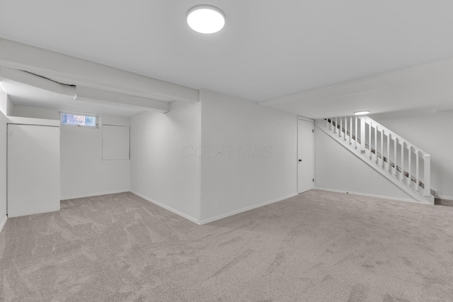 7847 Maplecreek Ct, Powell, OH 43065 - below grade area with carpet floors, baseboards, and stairs