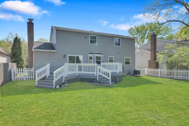 7847 Maplecreek Ct, Powell, OH 43065 - rear view of house featuring central air condition unit, a lawn, a wooden deck, and a fenced backyard