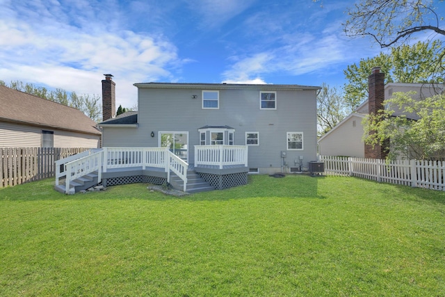 7847 Maplecreek Ct, Powell, OH 43065 - back of house with a fenced backyard, central air condition unit, a yard, and a deck