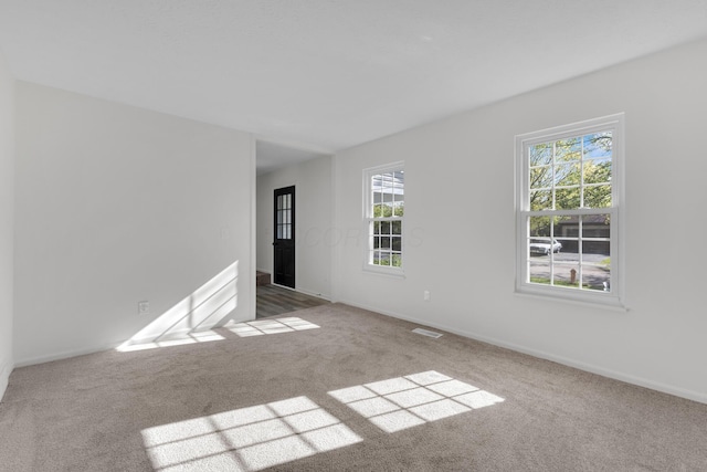 7847 Maplecreek Ct, Powell, OH 43065 - unfurnished room with carpet floors, baseboards, and visible vents