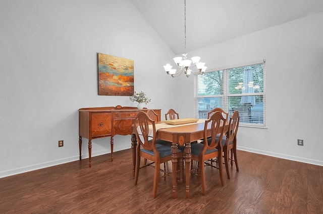 dining room featuring baseboards, vaulted ceiling, wood finished floors, and a chandelier