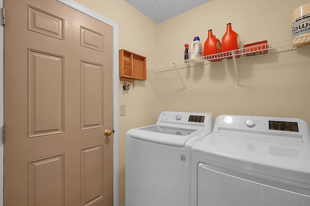laundry area featuring laundry area and washing machine and dryer