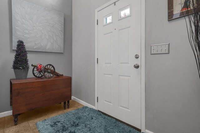 foyer with baseboards