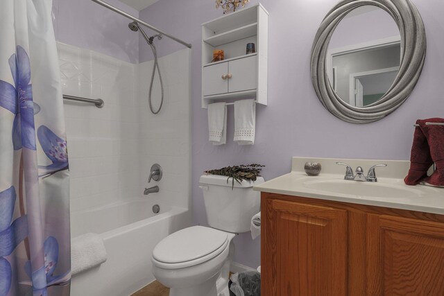 bathroom featuring vanity, shower / bathtub combination with curtain, and toilet