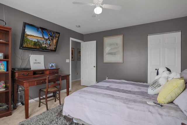 carpeted bedroom with ceiling fan