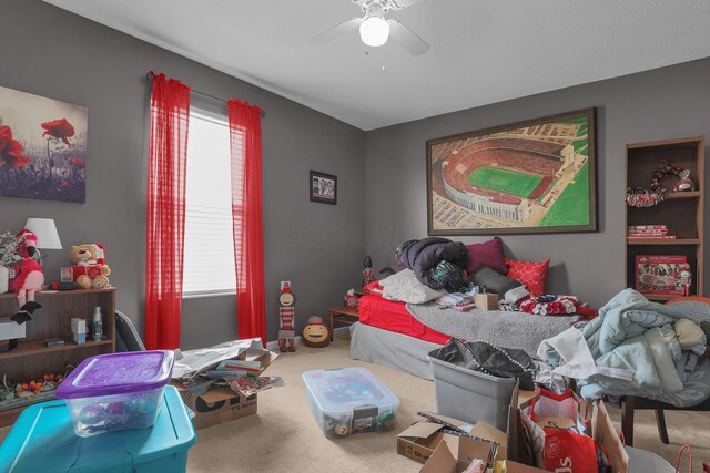 bedroom with carpet flooring and ceiling fan