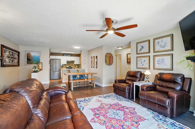 5688 Blendonridge Dr Unit 93E, Columbus, OH 43230 - living room featuring baseboards, a ceiling fan, and wood finished floors