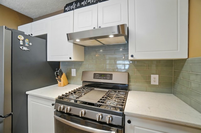 5688 Blendonridge Dr Unit 93E, Columbus, OH 43230 - kitchen with under cabinet range hood, white cabinetry, and appliances with stainless steel finishes