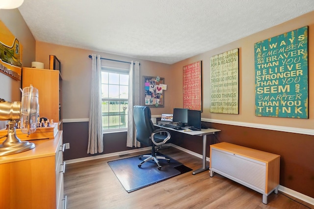 5688 Blendonridge Dr Unit 93E, Columbus, OH 43230 - office space featuring baseboards, a textured ceiling, and wood finished floors