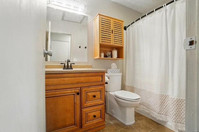 5688 Blendonridge Dr Unit 93E, Columbus, OH 43230 - bathroom with toilet, tile patterned floors, a shower with curtain, and vanity