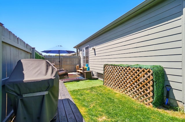 5688 Blendonridge Dr Unit 93E, Columbus, OH 43230 - view of yard featuring outdoor lounge area, fence, and a wooden deck